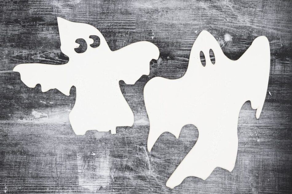 An image containing two cut outs of ghost outlines.